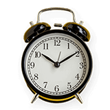 An analog alarm clock.