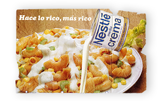 An ad for Media Crema with a can pouring table cream onto a plate of shrimp, corn and olives.