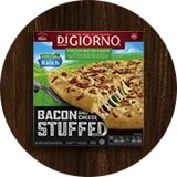 A multi-colored box of DiGiorno® Hidden Valley® Ranch Bacon and Cheese Stuffed Pizza with an image of a gooey cheese pull.