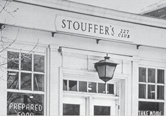 A black and white picture of the entrance and address of the second Stouffer's restaurant.