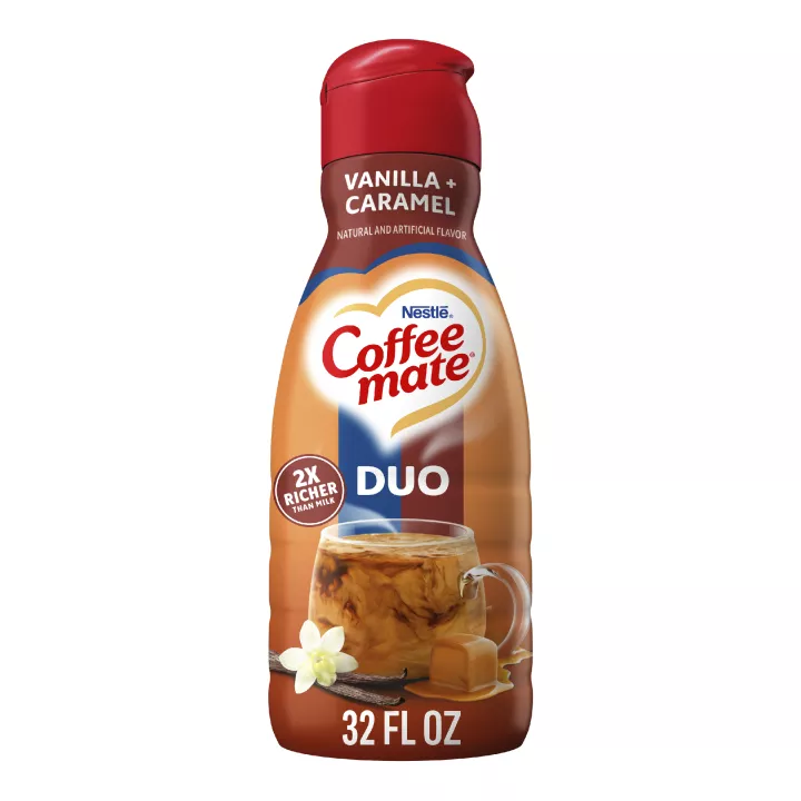 A red bottle of Vanilla Caramel creamer with a coffee mug and melted caramel under the Coffee mate logo.