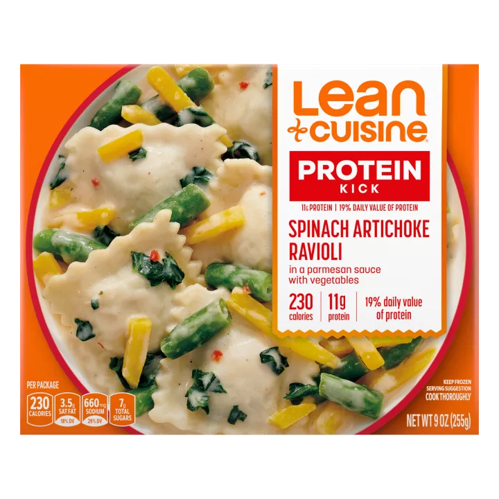 A box of Spinach Artichoke Ravioli with the Protein Kick label beside near a bowl of artichoke and cheese ravioli.