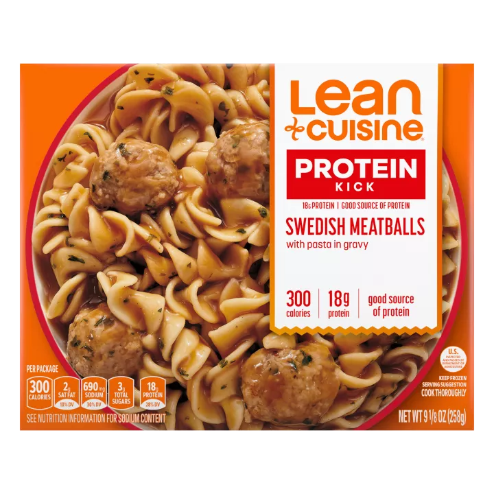 A box of Swedish Meatballs with a Protein Kick label near a bowl of meatballs and pasta covered with gravy.