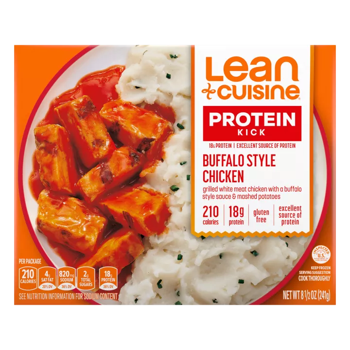 A box of Buffalo Style Chicken with a Protein Kick label near a bowl of grilled buffalo chicken with creamy mashed potatoes.