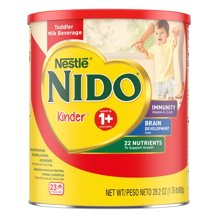 A canister of Nido 1+ with an “immunity, Vitamins A, C, & D, Iron, and Zinc” badge near a young boy clapping.