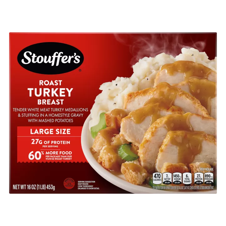 Caja de Roast Turkey Breast con un plato de pavo, relleno y papas debajo del nombre del producto y una etiqueta que dice "27 g de proteína".