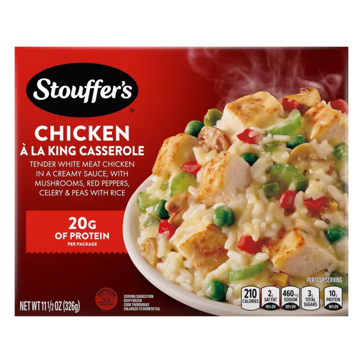 Box of Chicken à la King with a plate of chicken, vegetables and rice below the product name and STOUFFER'S logo.