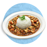  Close up of gumbo and a scoop of rice in a white bowl, on a blue background.