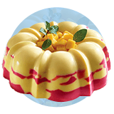 A mango gelatin ring with cherry swirls and diced mangos on top with mint garnish.
