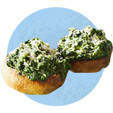 Cheesy stuffed mushrooms on an blue circle.