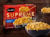 Steaming bowl of mac n cheese in front of red box with Stouffer’s logo in top left and SUPREME in gold font across middle.