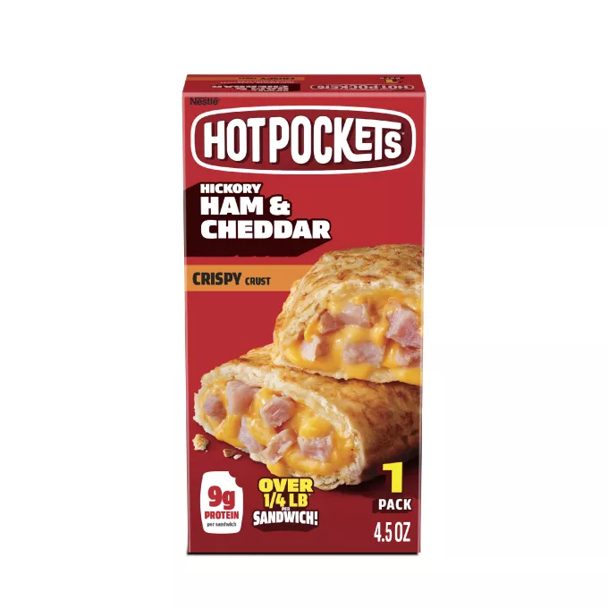 Vista frontal centrada de caja con peso neto de 4.5oz (127g) de 1 sándwich Hot Pockets sabor Ham and Cheddar Crispy Crust.