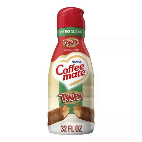 A bronze bottle of Twix® flavored coffee creamer with the green Zero Sugar label above the Twix logo and a candy bar.