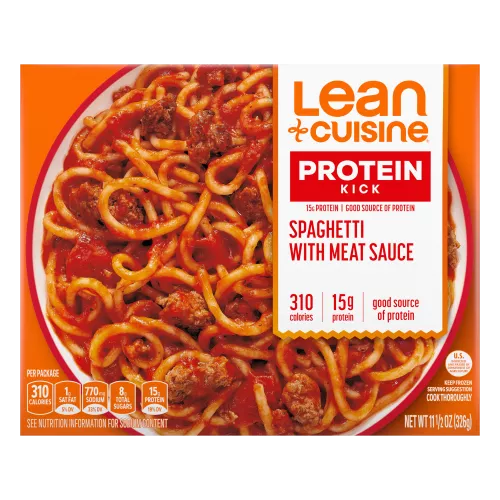 A box of Spaghetti with Meat Sauce with the Protein Kick label near a bowl of spaghetti covered with a meat sauce. 