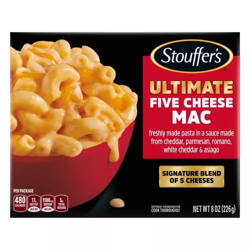 Box of Ultimate Five Cheese Mac with a Signature Blend of Five Cheeses label near a red bowl of cheesy macaroni and cheese.