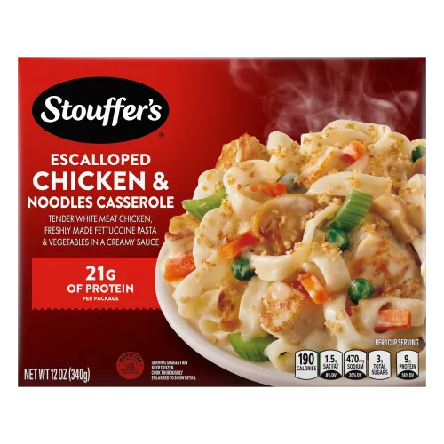 Box of Escalloped Chicken & Noodles featuring a plate with pasta, chicken and vegetables below the product name and logo.