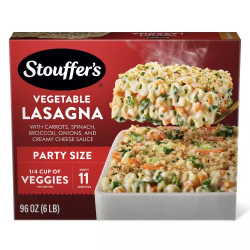 Box of Veggie Lovers Lasagna with a dish full of lasagna on a table with the product name and "PARTY SIZE" label.