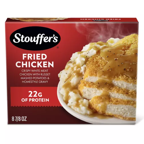 Box of Fried Chicken with a plate of chicken, mashed potatoes and gravy beside the product name and STOUFFER'S logo.