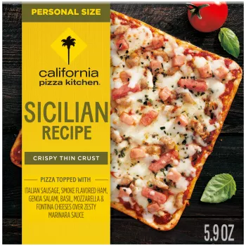 Box of Sicilian Recipe Pizza with pizza, tomato & basil on a dark wooden surface with Personal Size label.