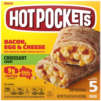 A yellow box of Bacon, Egg & Cheese Hot Pockets with a croissant crusted sandwich on a green label.