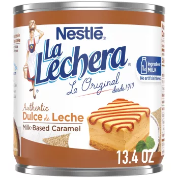 A can of Dulce de Leche featuring the La Lechera logo and a square slice of flan drizzled with caramel.