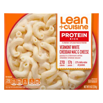 A box of Vermont White Cheddar Mac and Cheese with a Protein Kick label near a bowl of macaroni with Vermont cheddar sauce.