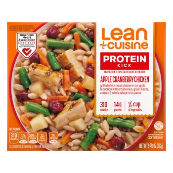 A box of Apple Cranberry Chicken with a Protein Kick label near a bowl of chicken, cranberries, apples, vegetables and orzo.