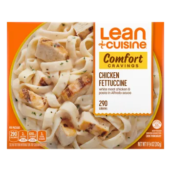 A box of Chicken Fettuccine with a Comfort Cravings label near a bowl of Fettuccine and chicken covered with alfredo sauce.