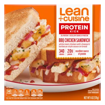 A box of BBQ Chicken Sandwich with a Protein Kick label near a cooked sandwich cut in half.