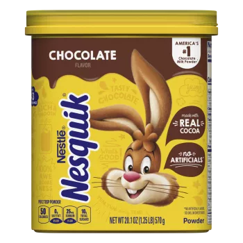 A yellow container with the Nesquik bunny, a brown label, and a glass of chocolate milk.