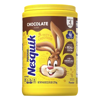 A yellow container with the Nesquik bunny, a brown label, and a glass of chocolate milk.