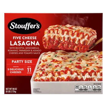 Box of Cheese Lovers Lasagna with a spatula lifting lasagna and made with 5 delicious cheeses and party size labels.