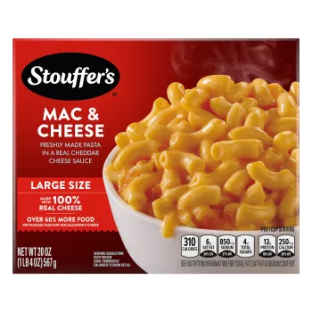 Box of Macaroni & Cheese with a plate of mac & cheese on a table under the product name and "100% REAL CHEESE" label.