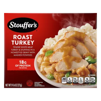 Box of Roast Turkey with a plate of turkey, stuffing, and mashed potatoes under the product name and STOUFFER'S logo.