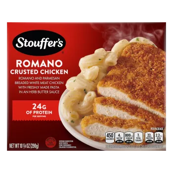 A plate of Romano Crusted Chicken with buttered pasta on a wood table below the product name and STOUFFER'S logo.