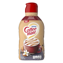 A bottle of Coffee mate Vanilla Caramel Powder with a coffee mug and melted caramel under the product logo.