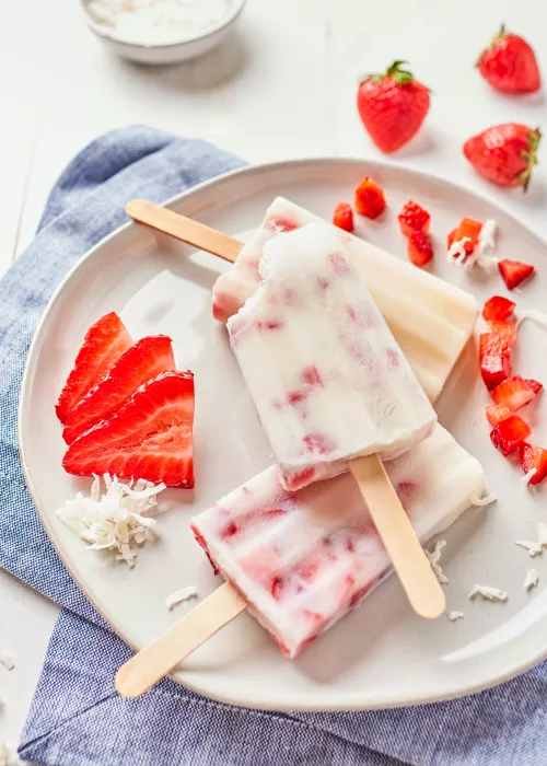 Fresas y paletas de crema