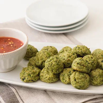 Spinach Soufflé Balls with Spicy Smokey Marinara Sauce