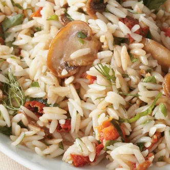 RISSOTTO WITH MUSHROOMS, FINE HERBS AND DRIED TOMATOES