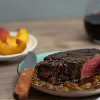 Beef Tenderloin Steaks with Peach Whiskey Sauce