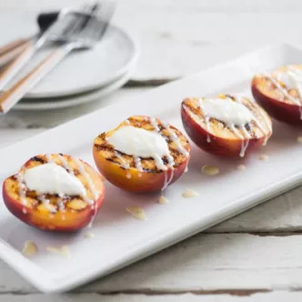 Grilled Peaches with Yogurt and Sweetened Condensed Milk