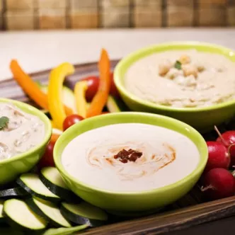 Maggi Chipotle Dip with Crackers and Vegetables
