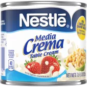 A can of Media Crema table cream with a blue label featuring strawberries, a bowl of macaroni, and cream.