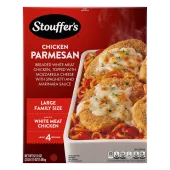 Box of Chicken Parmesan with a dish and plate of chicken and spaghetti below the product name and "25% MORE CHICKEN" label.
