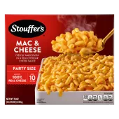 Box of Macaroni & Cheese with a dish of mac & cheese on a table under the product name and "100% REAL CHEESE" label.