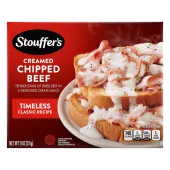 Box of Creamed Chipped Beef with a dish of creamed beef beside a plate of toast with beef below the product name and logo.