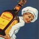 Close up circle cropped vintage ad featuring a young boy dressed as a chef carrying a large bottle of MAGGI liquid seasoning.